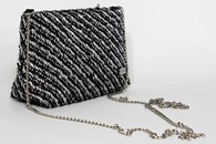 Black and Silver hand-woven mini purse (Side View)